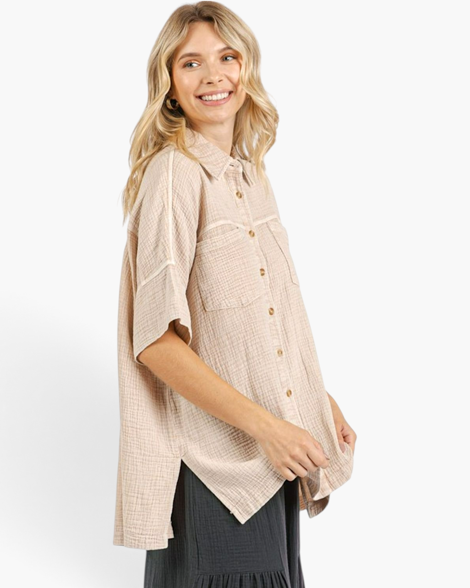 Beach Rose Co. sand cotton gauze oversized shirt with short sleeves, chest pockets, and a high-low hem on a model.