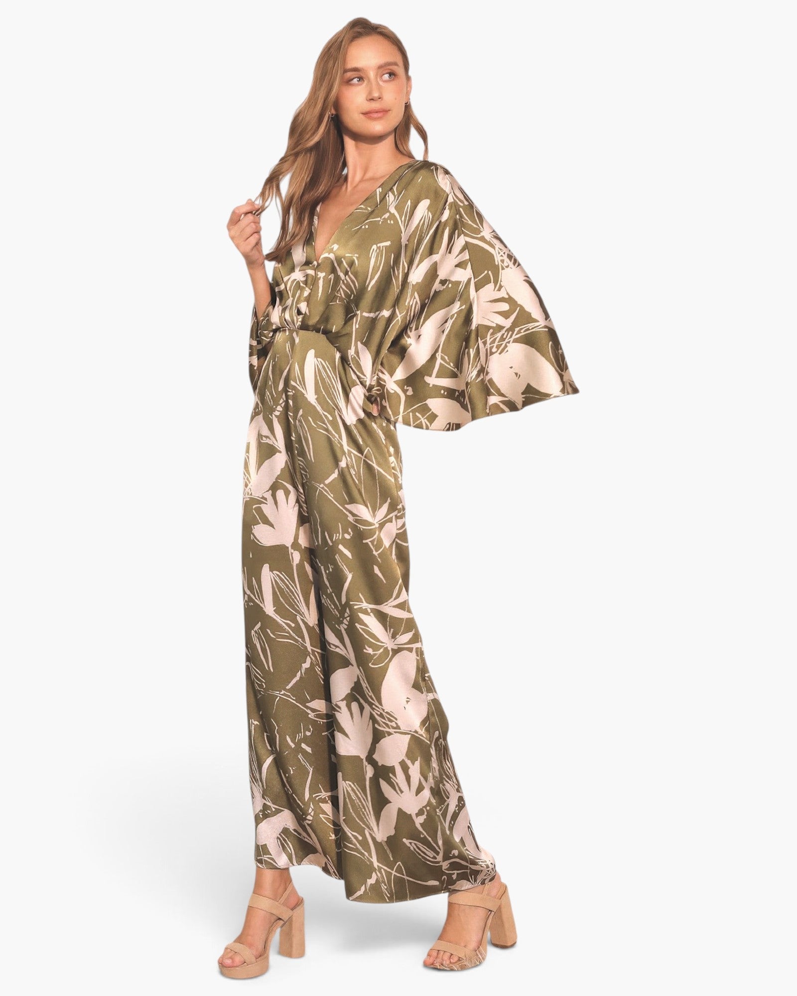 Beach Rose Co. Dreaming Lily satin cape jumpsuit in olive green with floral print and flowing cape sleeves