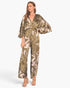 Beach Rose Co. Dreaming Lily satin cape jumpsuit in olive green with floral print and wide-leg silhouette
