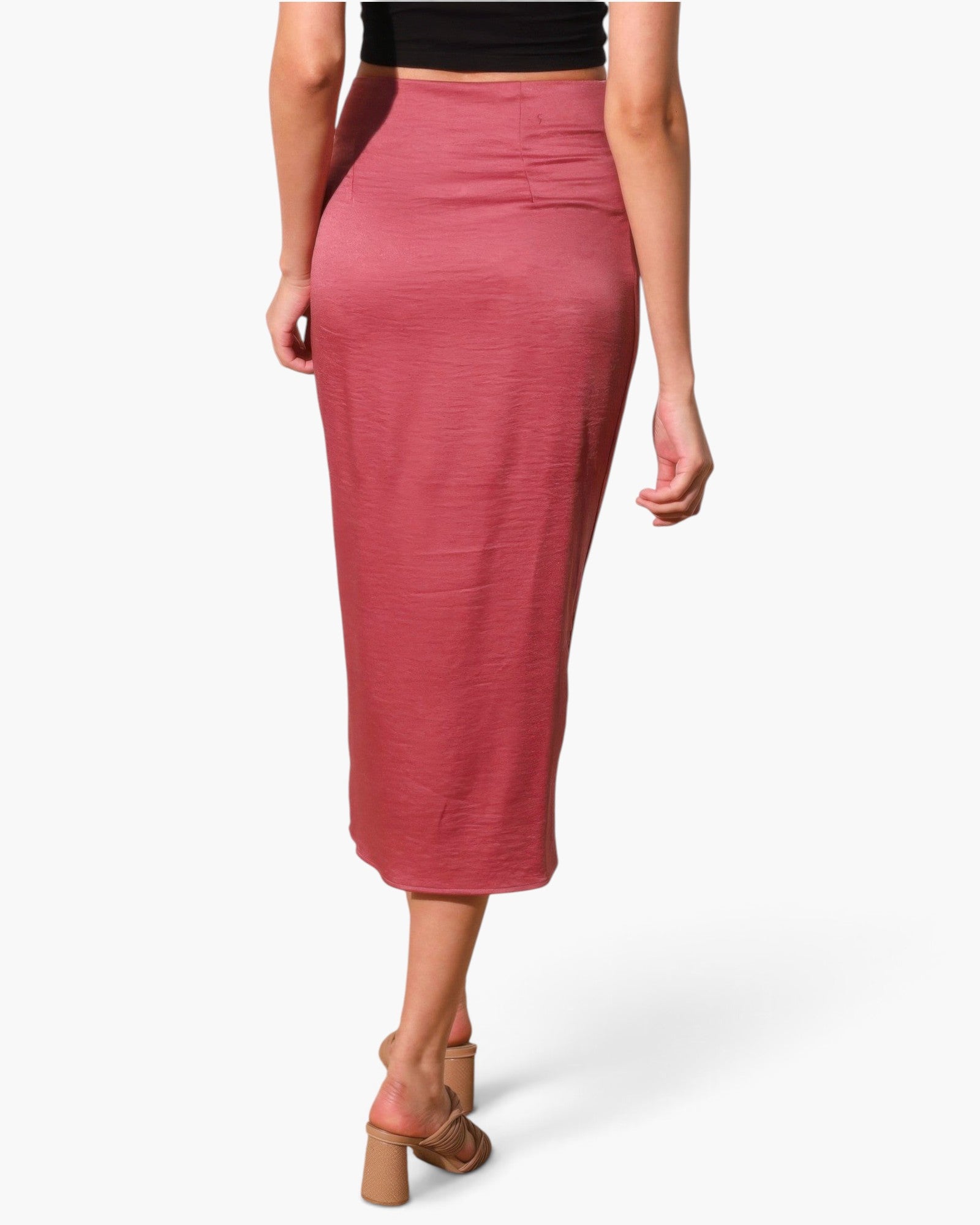 Beach Rose Co. washed satin crepe midi skirt in dusty rose with a side wrap tie, worn with a black top and heels.