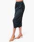 Beach Rose Co. dark grey washed satin crepe midi skirt featuring a side wrap design with an adjustable tie closure.