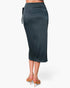 Beach Rose Co. dark grey washed satin crepe midi skirt with a side wrap tie closure worn with nude heeled sandals.