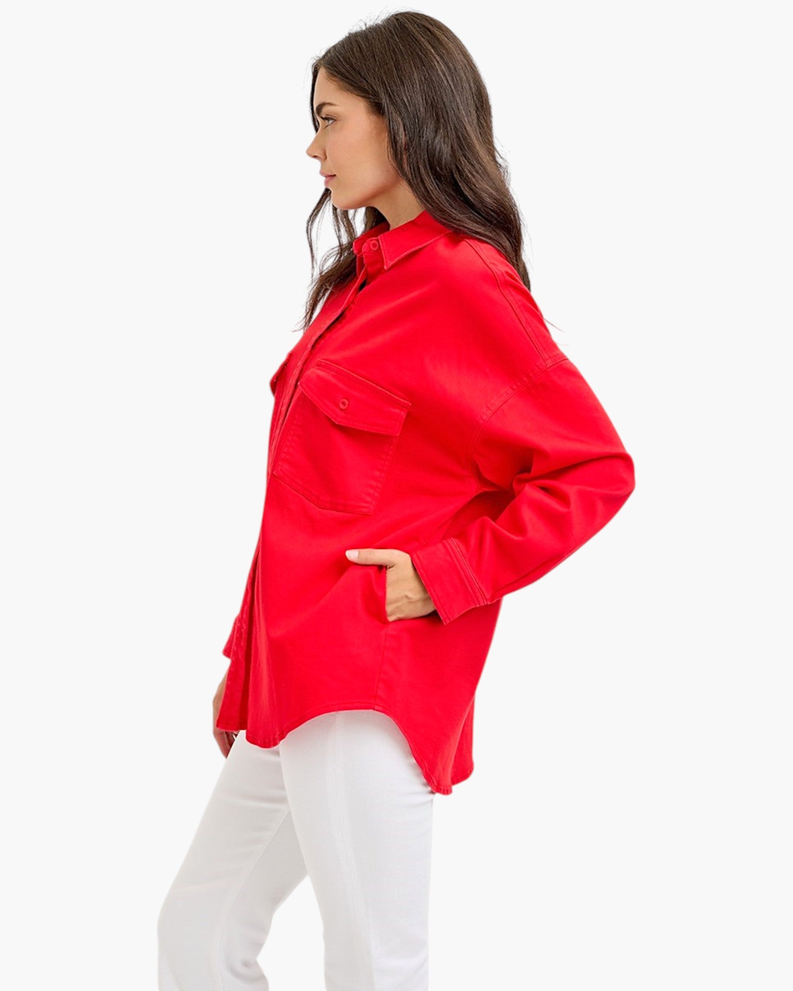 Beach Rose Co. scarlet oversized denim shirt jacket with dropped shoulders and chest pockets, side view on a model.