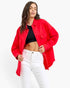 Beach Rose Co. scarlet oversized denim shirt jacket with button-front closure and chest pockets on a female model