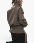 Beach Rose Co. brown viscose short trench jacket with a high wrap collar, shoulder tabs, and a buckled waist belt.