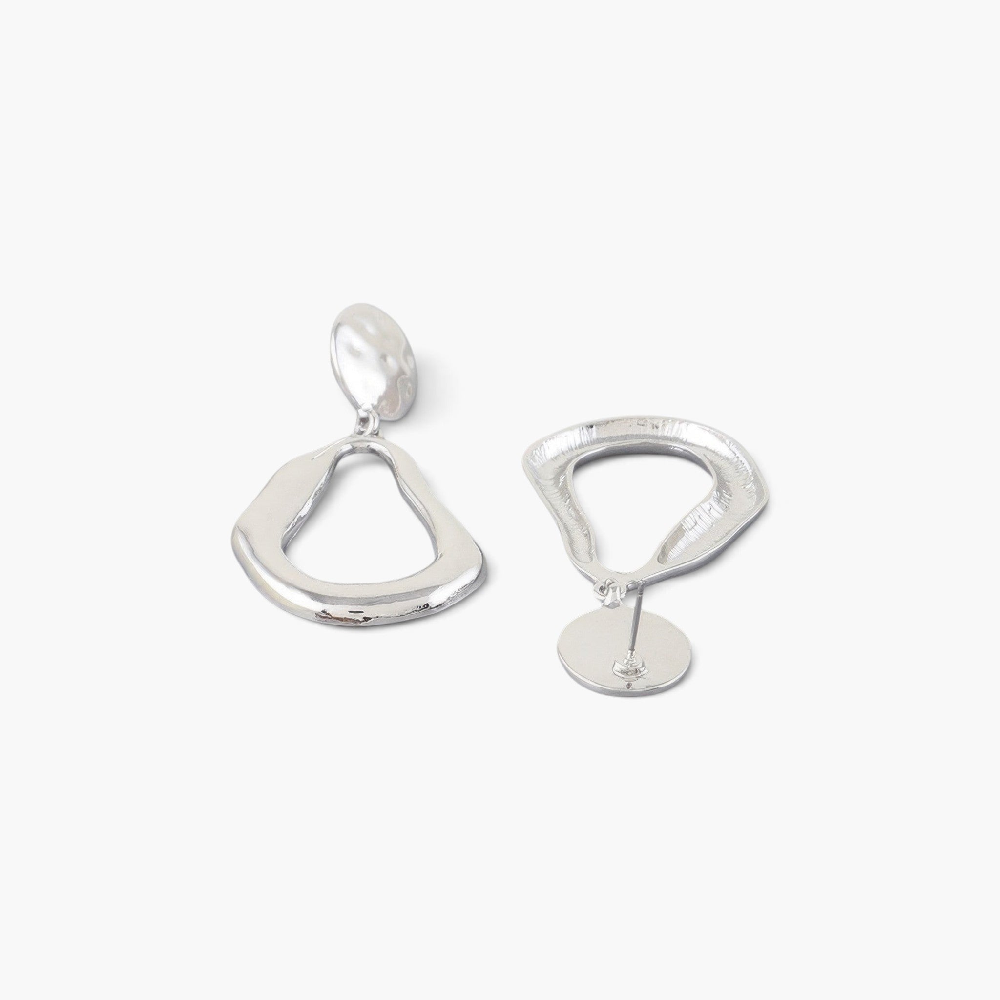 Beach Rose Co. silver-tone abstract teardrop earrings with a polished, reflective finish and post-back closure.