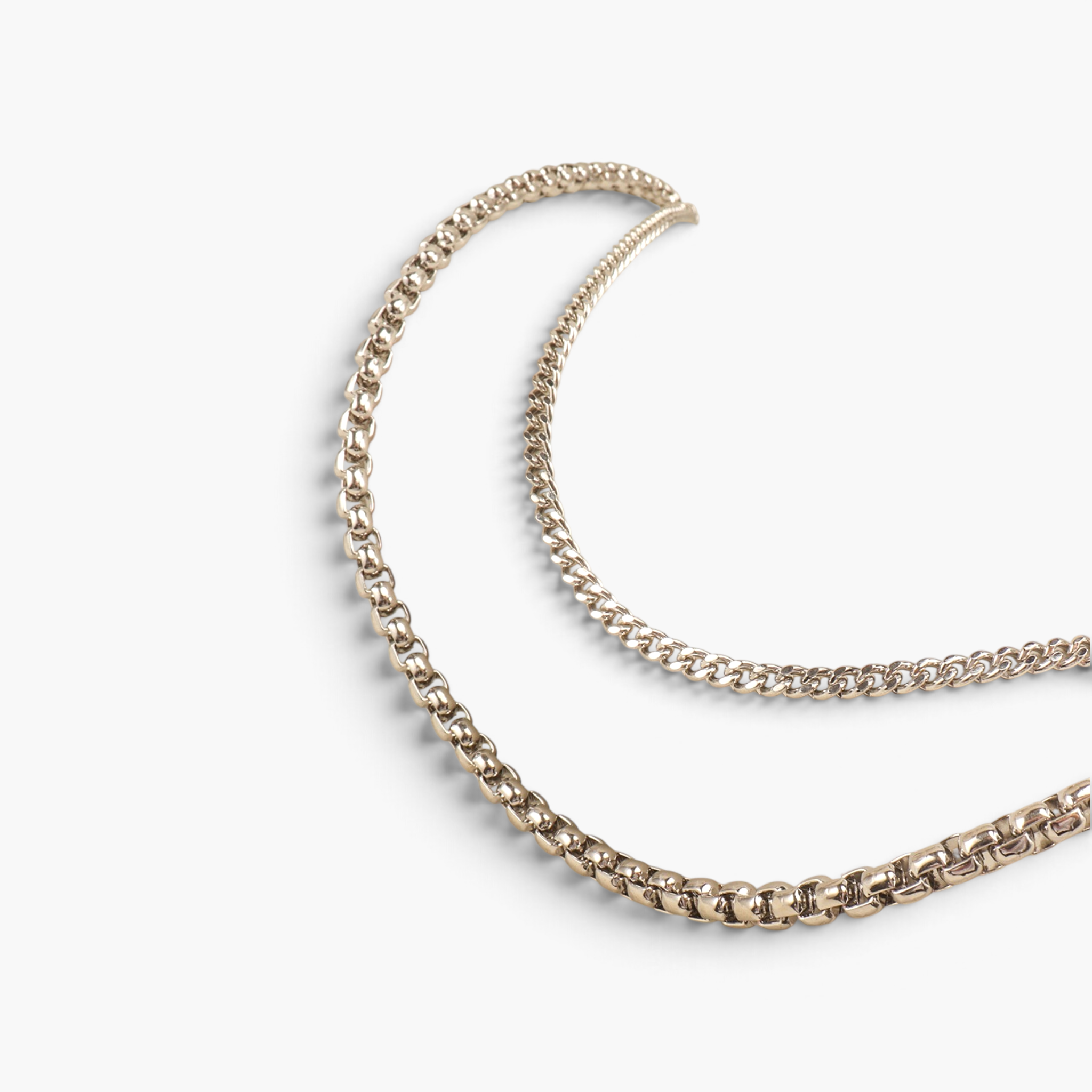 Beach Rose Co. silver-tone double layer pants chain with contrasting iron link styles for a textured statement look.
