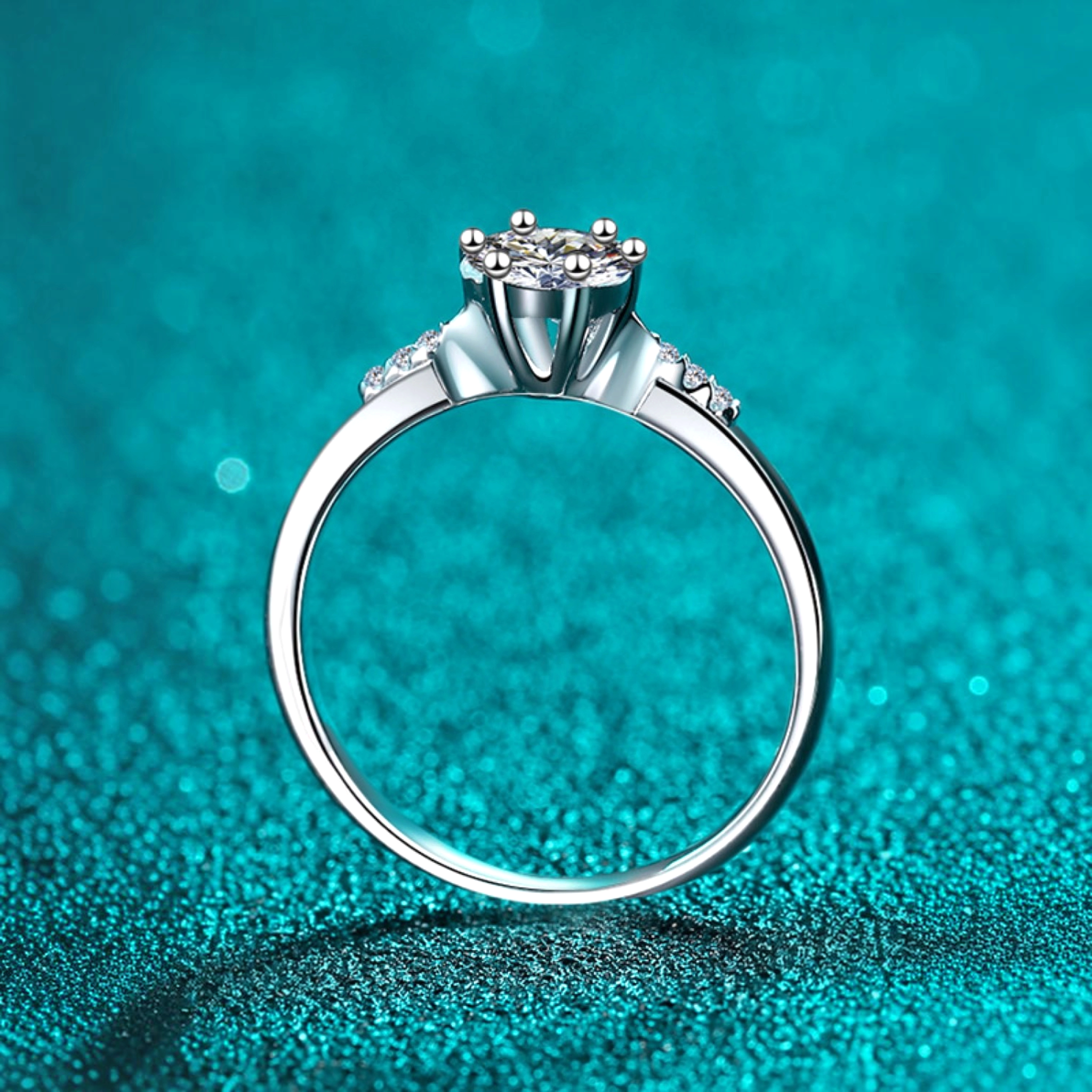 Beach Rose Co. silver floral cluster ring with moissanite and zircon accents on a slim rhodium-plated sterling band.