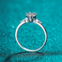 Beach Rose Co. silver floral cluster ring with moissanite and zircon accents on a slim rhodium-plated sterling band.