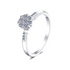 Beach Rose Co. silver floral cluster ring with moissanite and zircon stones on a slim rhodium-plated sterling band.