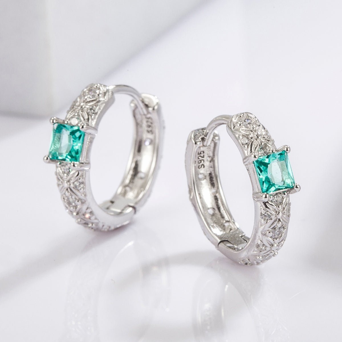 Beach Rose Co. - Silver Inlaid Aqua Zircon Huggie Earrings