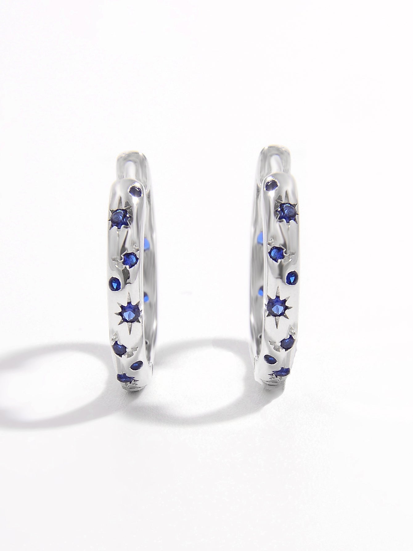 Beach Rose Co. - Silver Inlaid Blue Zircon Huggie Earrings