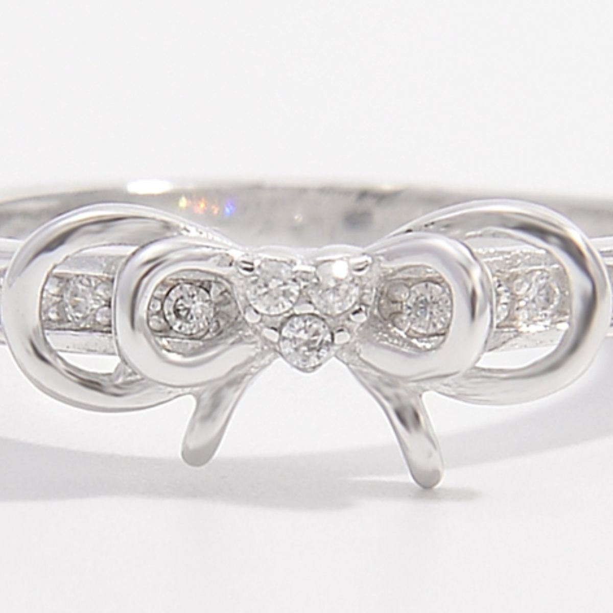 Beach Rose Co. - Silver Inlaid Zircon Bow Ring