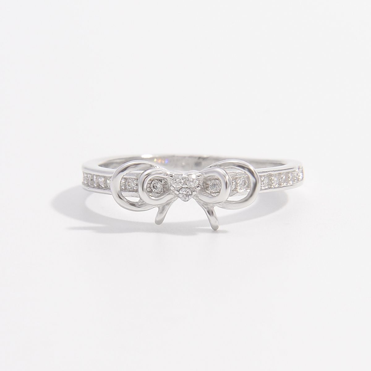 Beach Rose Co. - Silver Inlaid Zircon Bow Ring