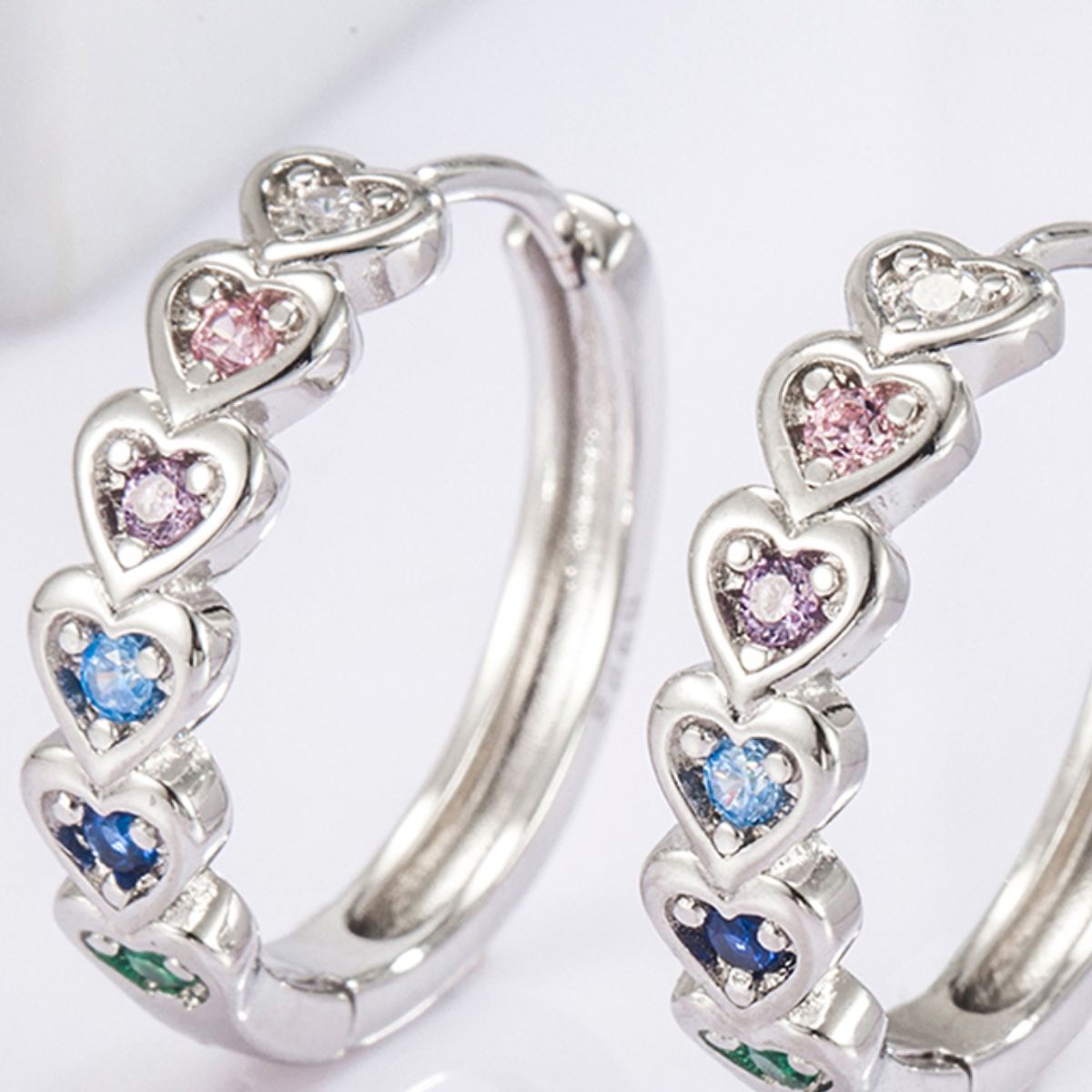 Beach Rose Co. - Silver Inlaid Zircon Heart Huggie Earrings