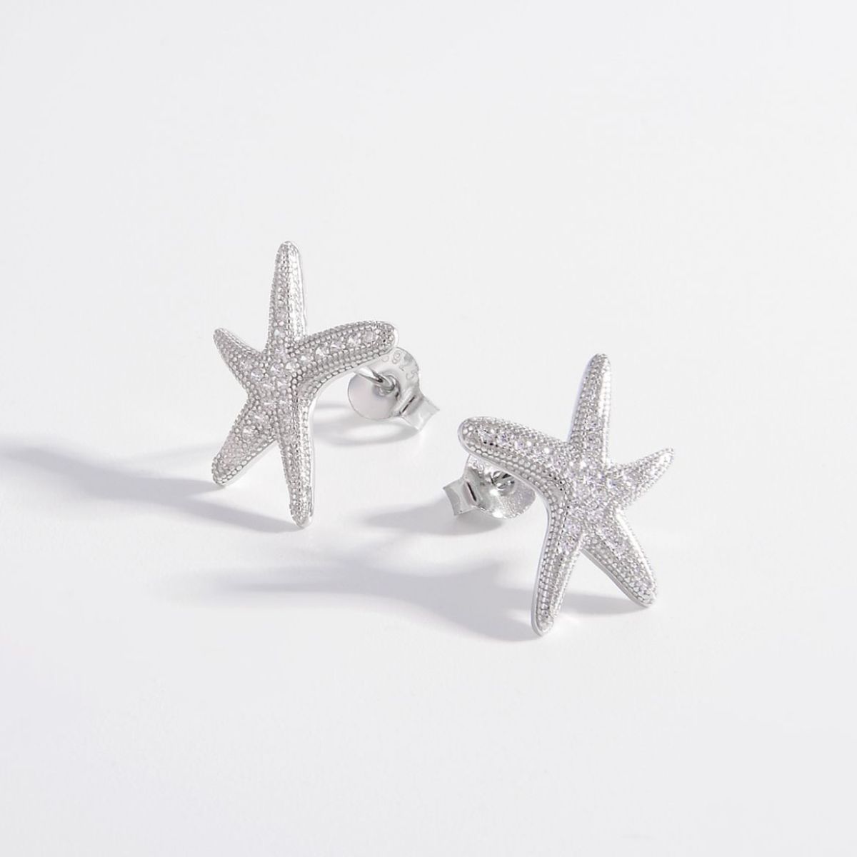 Beach Rose Co. - Silver Inlaid Zircon Starfish Earrings