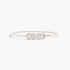 Beach Rose Co. slim silver metal waist belt featuring an intricate interwoven knot buckle with textured detailing.