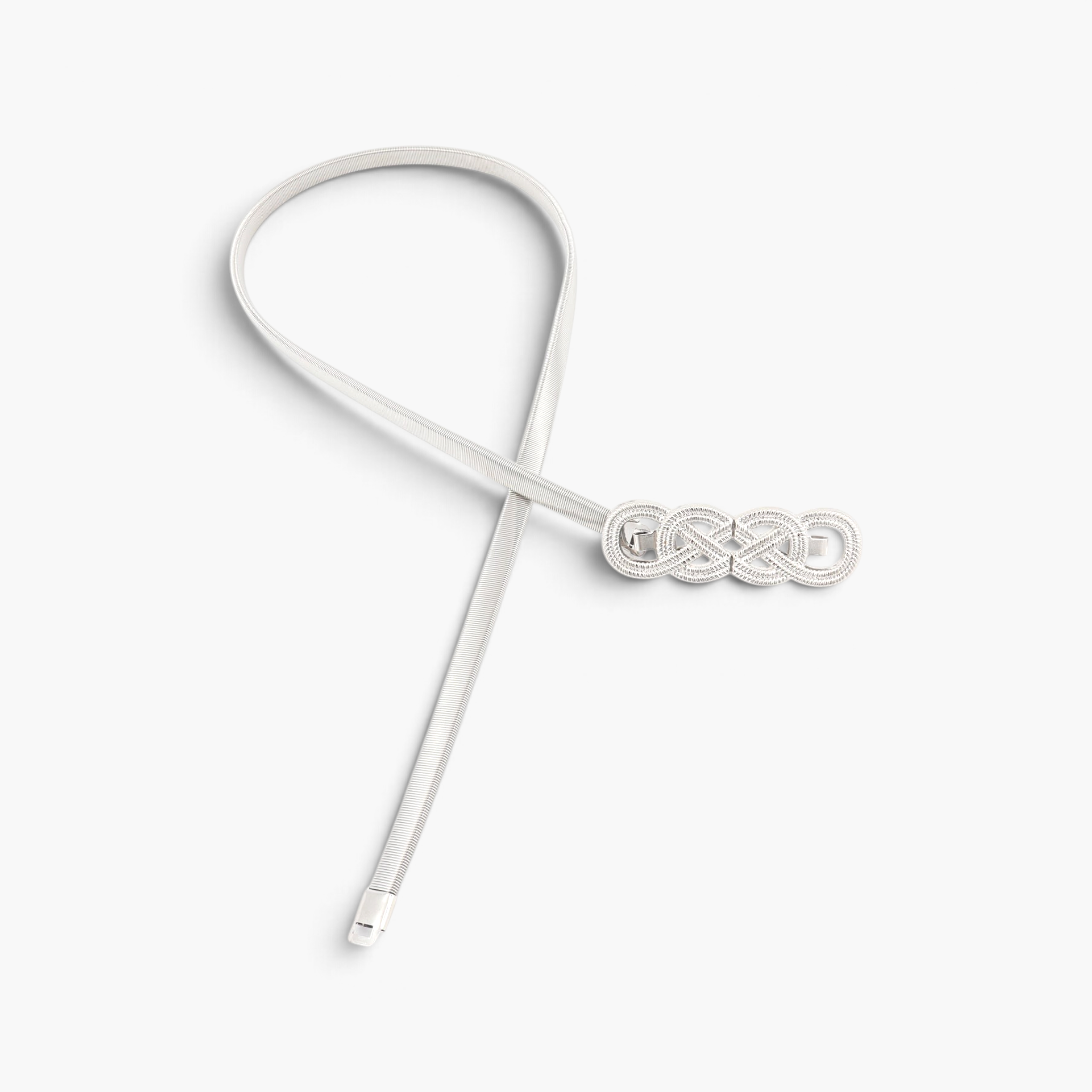 Beach Rose Co. slim silver metal waist belt featuring an intricate interwoven knot buckle and a finely ridged band.