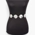 Beach Rose Co. silver metal chain belt featuring circular medallions with intricate embossed detailing on a mannequin