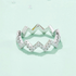 Beach Rose Co. platinum-plated sterling silver zigzag band ring featuring 0.38 carat round moissanite stones.