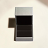 Beach Rose Co. silver ring gift box with a textured finish and dark interior, presented on a neutral background.