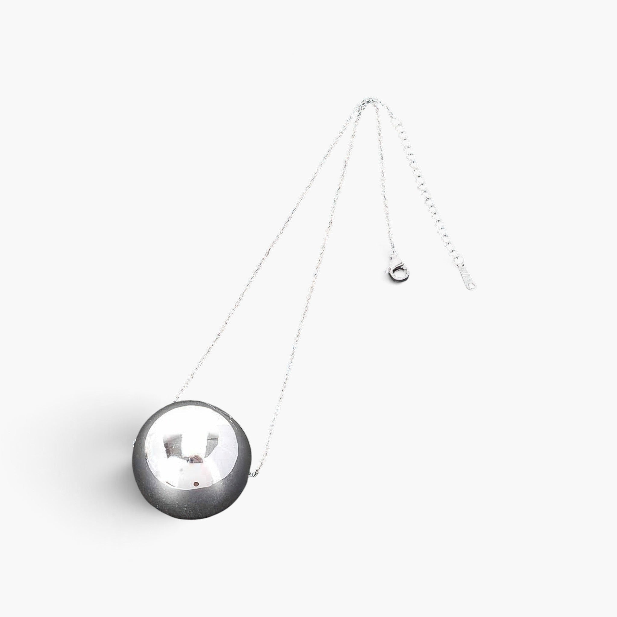 Beach Rose Co. silver CCB necklace featuring a large, polished round ball pendant on a delicate chain