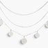 Beach Rose Co. silver triple round charm chain necklace with delicate minimalist discs on a fine polished metal chain