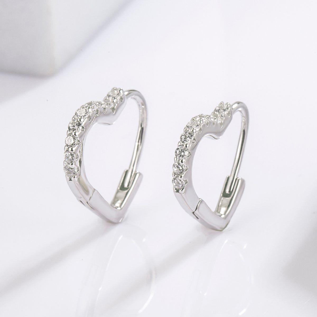 Beach Rose Co. - Silver Zircon Heart Shape Huggie Earrings