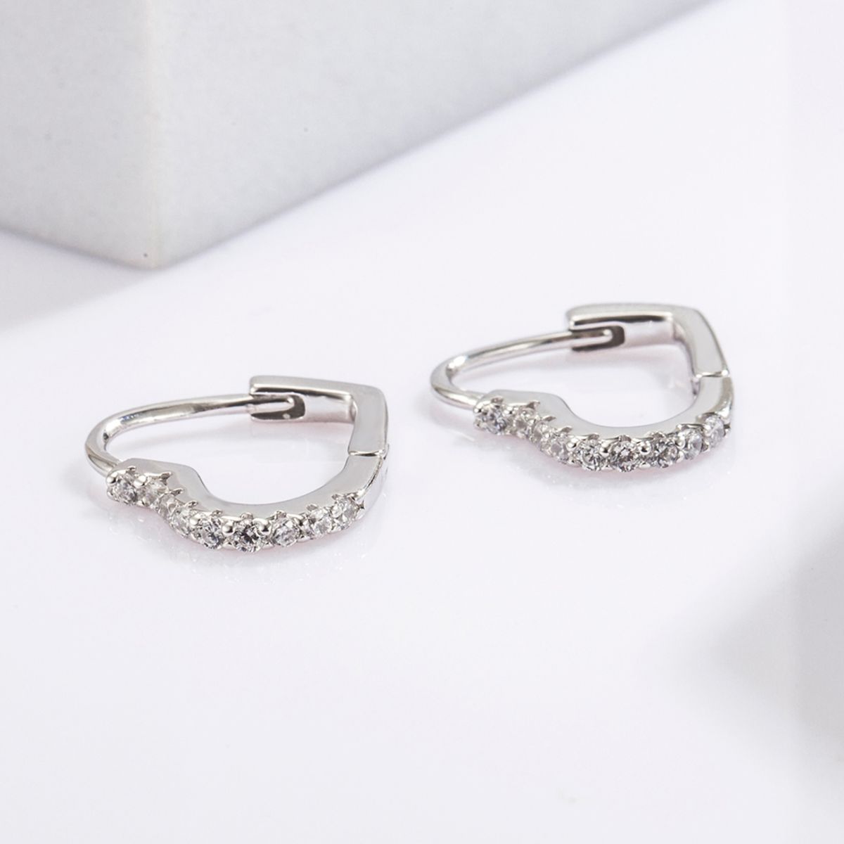 Beach Rose Co. - Silver Zircon Heart Shape Huggie Earrings