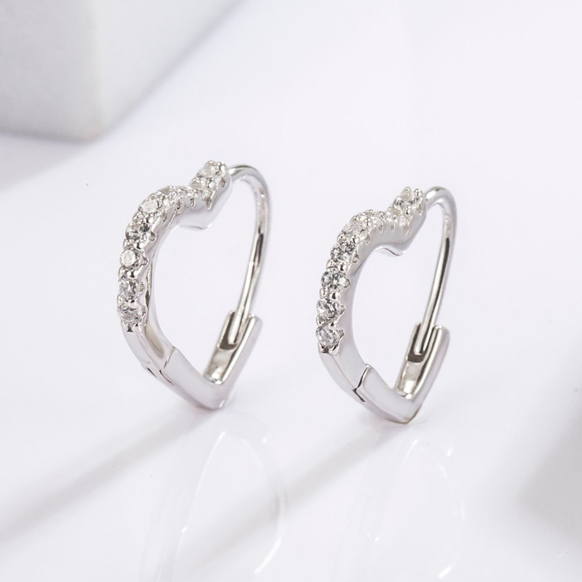 Beach Rose Co. - Silver Zircon Heart Shape Huggie Earrings