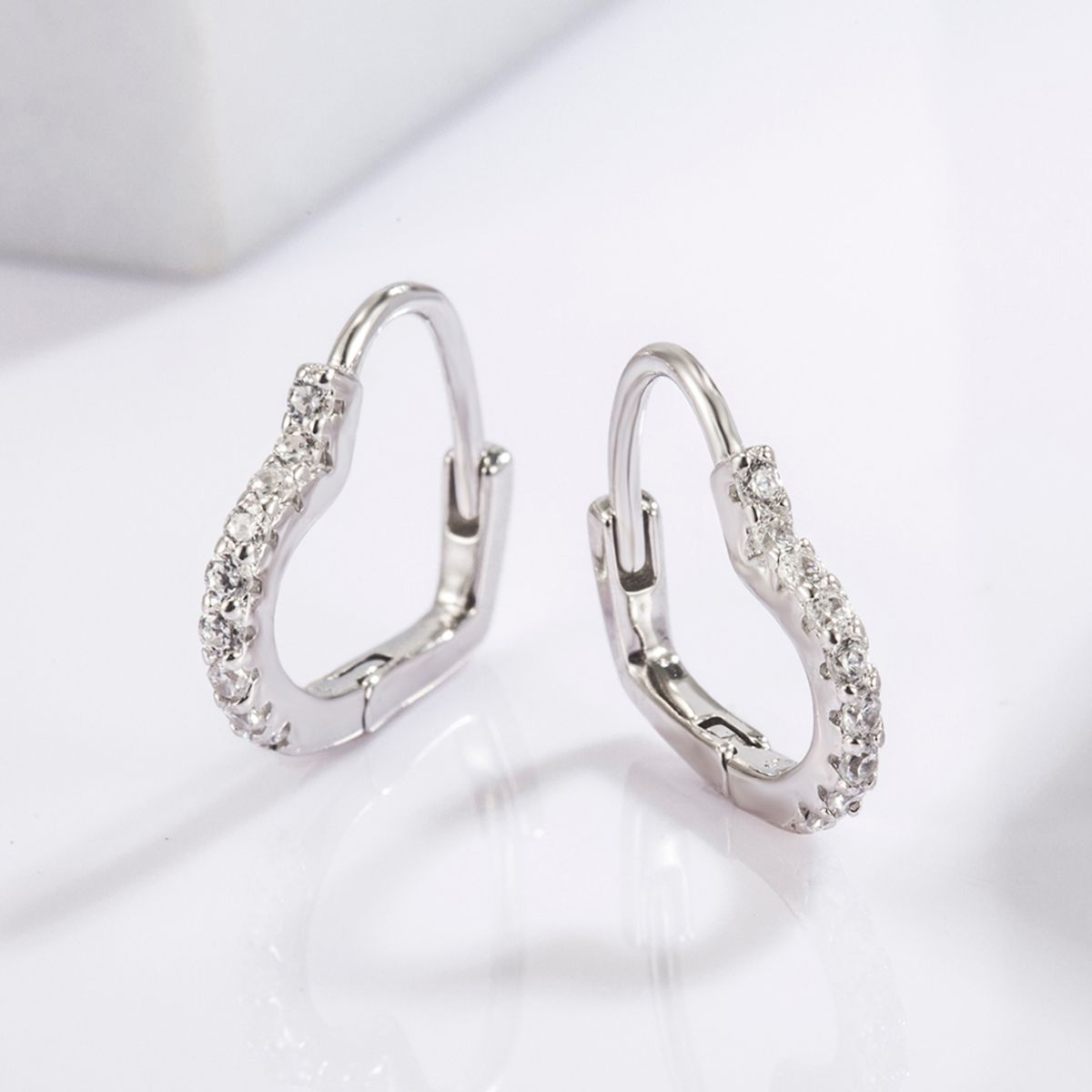 Beach Rose Co. - Silver Zircon Heart Shape Huggie Earrings