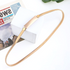 Beach Rose Co. slim gold-tone iron waist belt with a polished rectangular clasp and a finely ridged metal band.