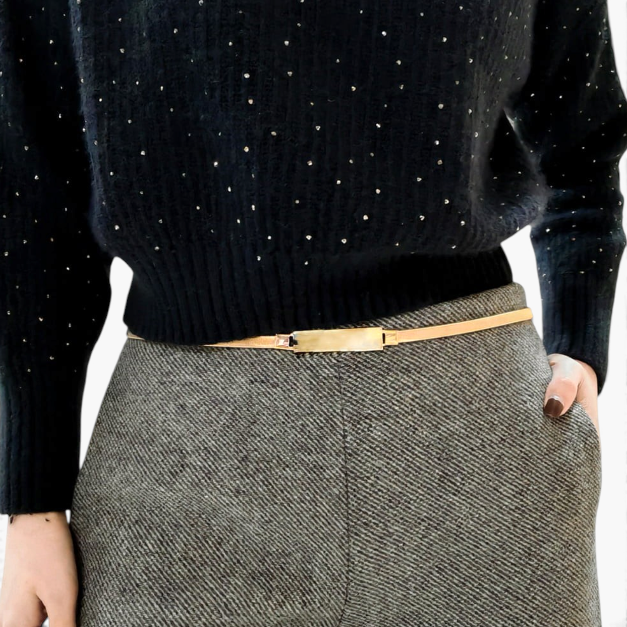 Beach Rose Co. slim gold-toned metal waist belt with a polished rectangular clasp worn over grey trousers.