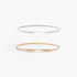 Beach Rose Co. slim iron waist belts in silver and gold with ridged bands and polished rectangular front clasps.