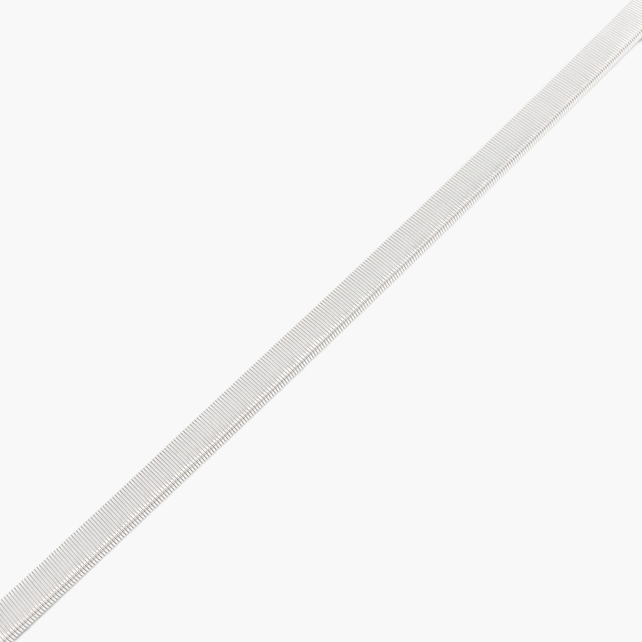 Beach Rose Co. slim silver-tone metal waist belt with a finely ridged texture for a polished jewelry-inspired look.
