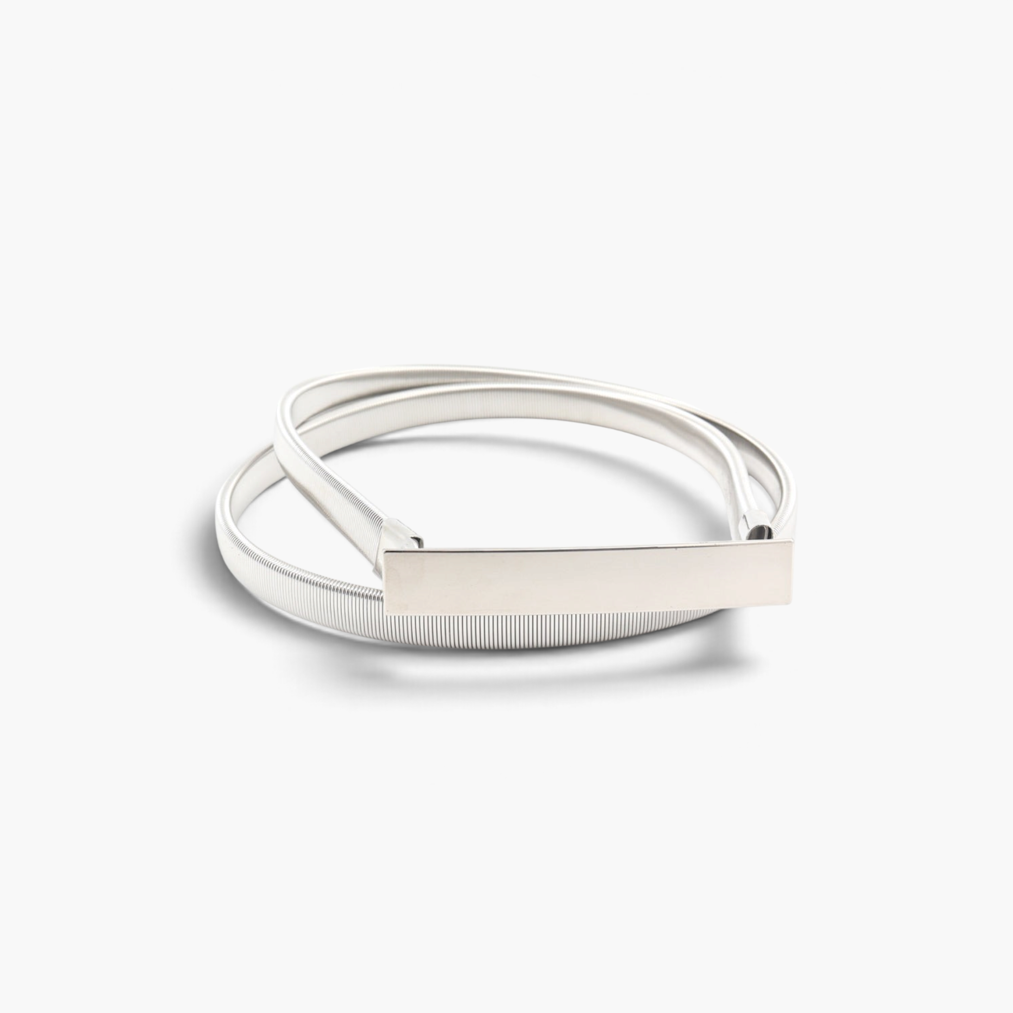 Beach Rose Co. slim silver iron waist belt with a textured ridged band and a polished rectangular front clasp.