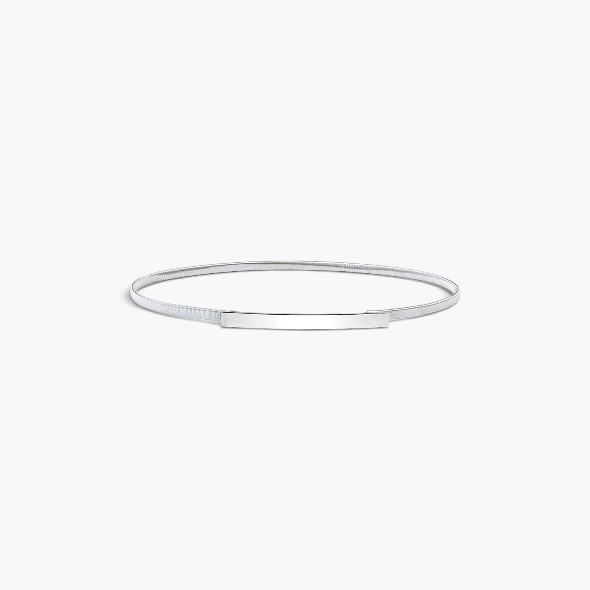 Beach Rose Co. slim silver iron waist belt with a textured ridged band and a polished rectangular front clasp.