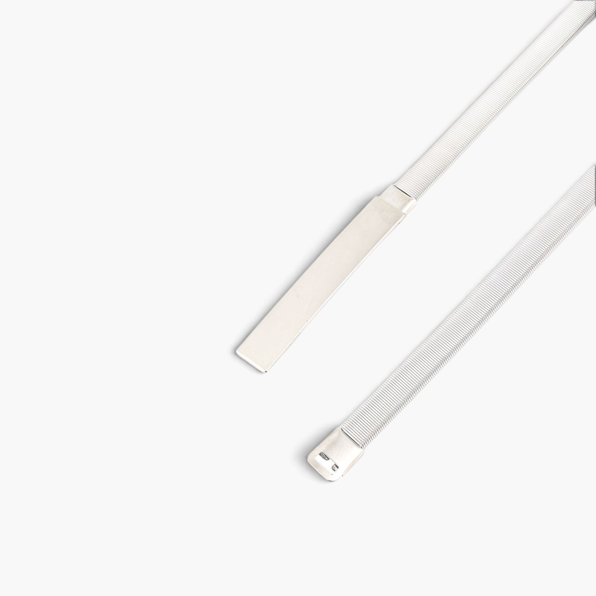 Beach Rose Co. slim silver iron waist belt with a textured ridged band and a polished rectangular metal clasp.