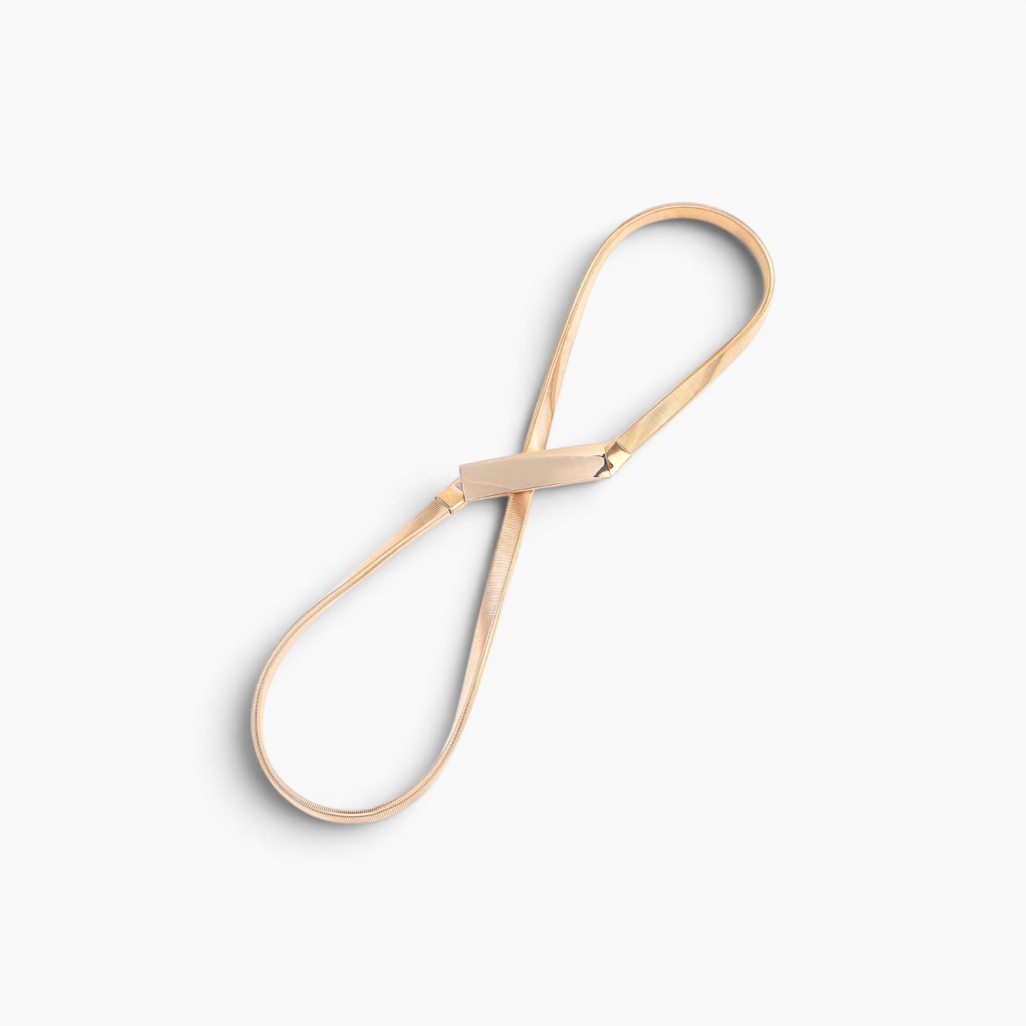 Beach Rose Co. slim gold-tone iron waist belt with a textured ridged band and a polished rectangular front clasp.