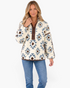 Beach Rose Co. cream and blue Southwestern print plush fleece half-zip pullover with brown trim on a blonde model.