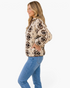 Beach Rose Co. cream and brown Southwestern print sherpa pullover with a half-zip neckline and brown seam trim.