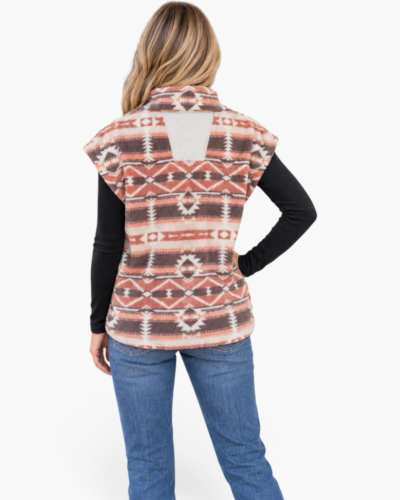 Beach Rose Co. sherpa vest with rust and cream Southwestern geometric print, stand collar, and back panel detail.