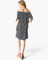 Beach Rose Co. black and ivory spotted off-shoulder dress with tie sleeves and relaxed swing fit, back view