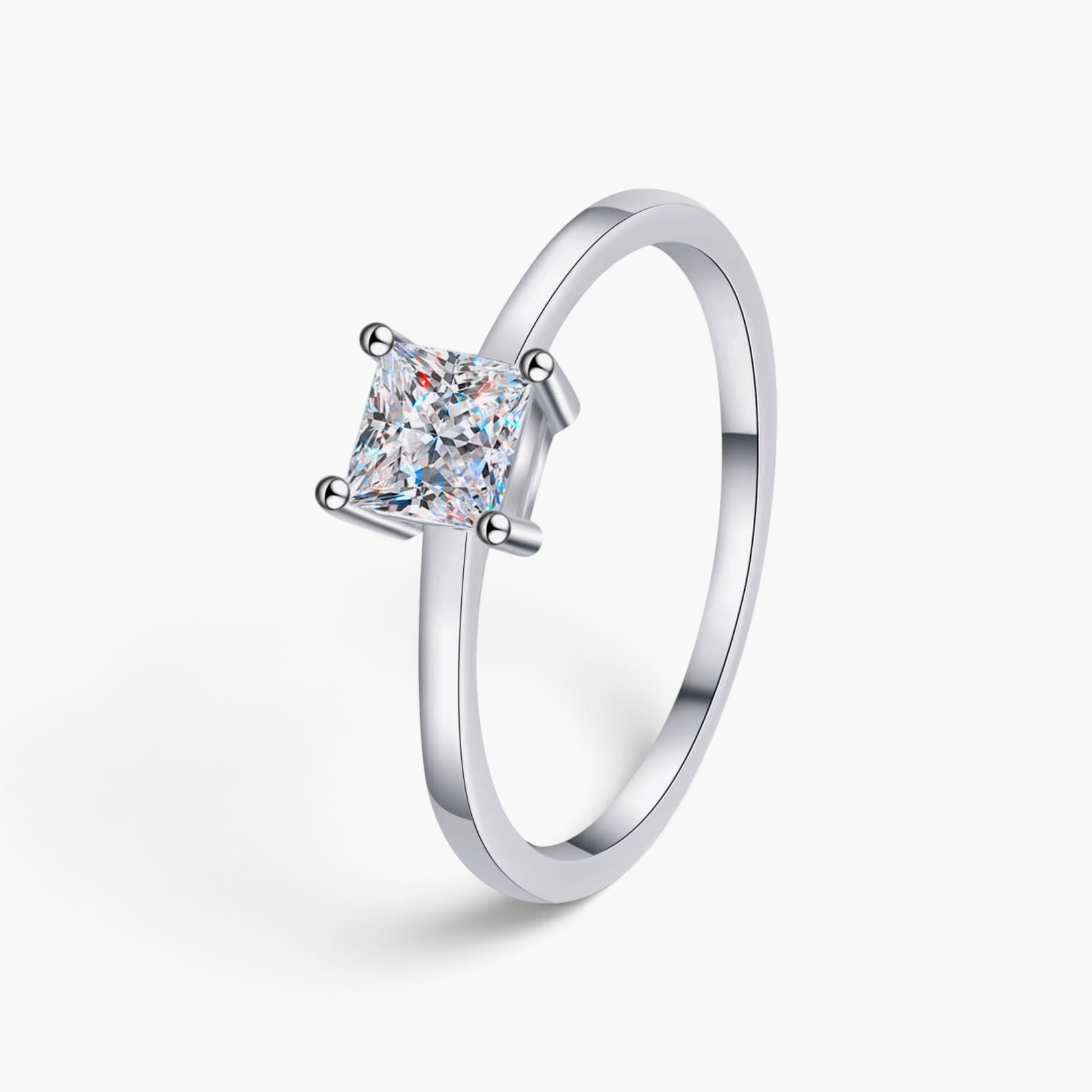 Beach Rose Co. square moissanite solitaire ring in rhodium-plated 925 sterling silver with a slim polished band.