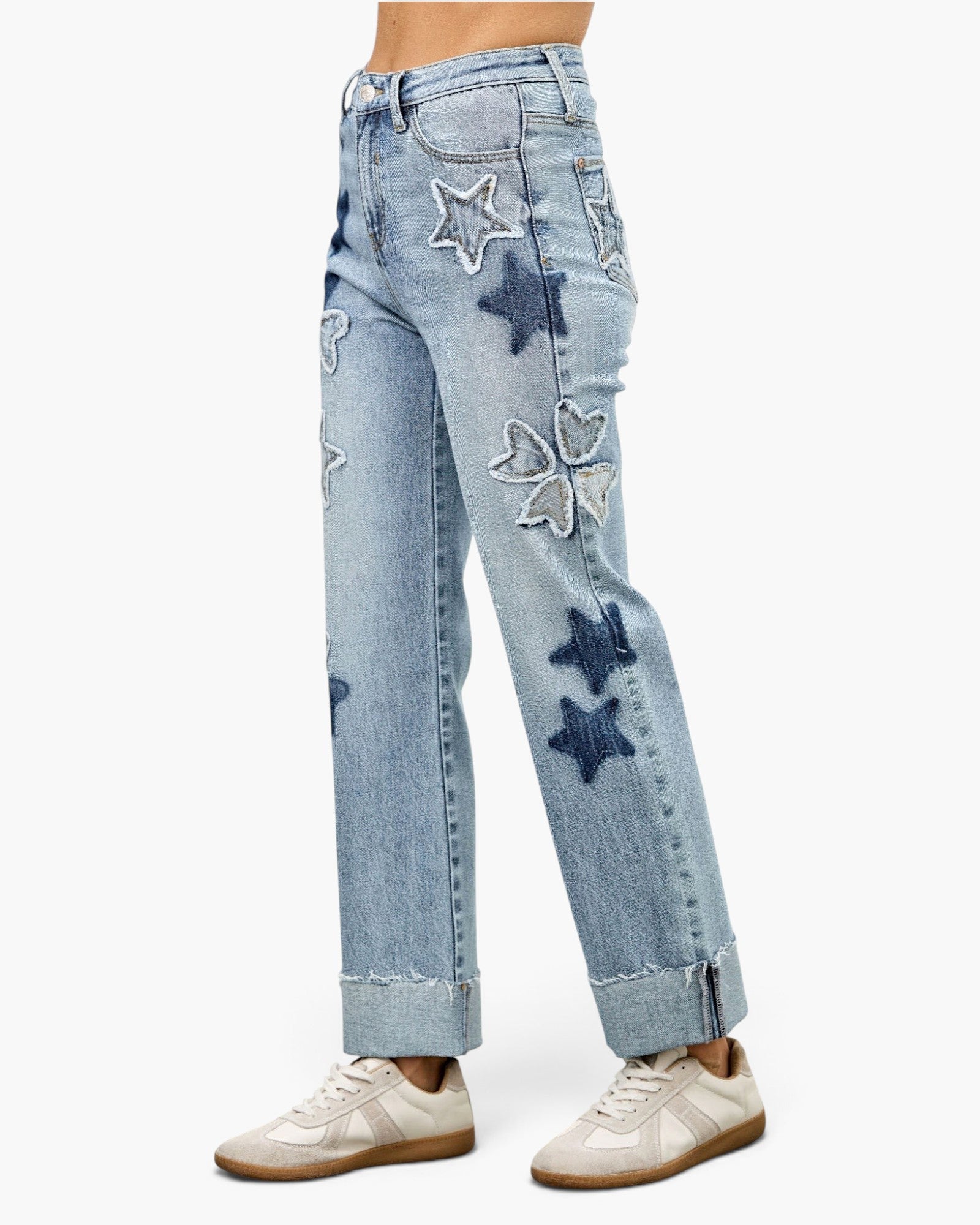 Beach Rose Co. high-rise dad jeans in light wash denim with star and heart patchwork and cuffed hems