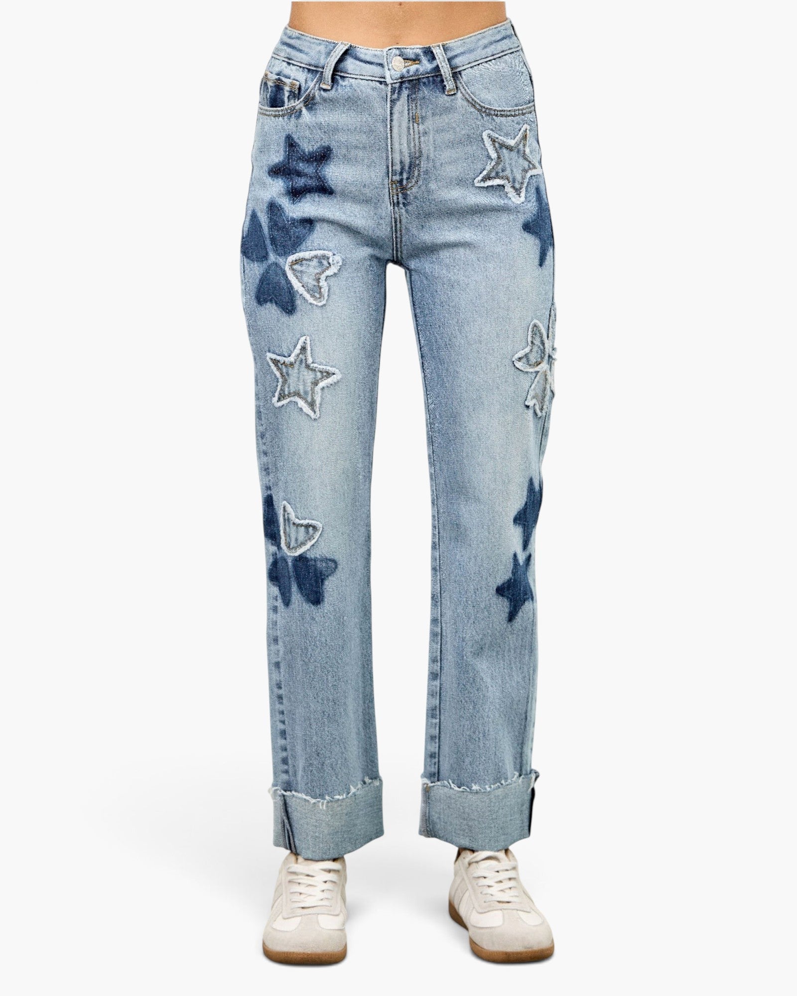 Beach Rose Co. high-rise dad jeans in light wash denim featuring playful star and heart patchwork and cuffed hems.