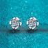 Beach Rose Co. sterling silver flower stud earrings featuring round moissanite stones with polished petal settings.