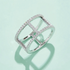 Beach Rose Co. sterling silver openwork ring featuring geometric bars and sparkling moissanite stones.