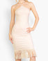 Beach Rose Co. stone ribbed halter neck midi dress with fringe hem detail on a model