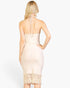 Beach Rose Co. stone ribbed halter neck midi dress with fringe hem seen from the back on a blonde model